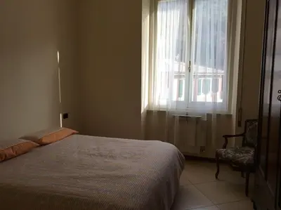 Letto o letti in una camera di La casa sul ponte: spacious apartment in Zoagli