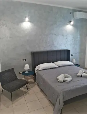 Letto o letti in una camera di La Nchioscia