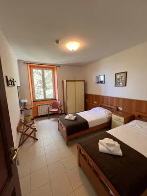 Letto o letti in una camera di Hotel Montallegro
