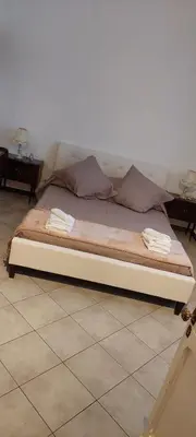 Letto o letti in una camera di Casa Retrò