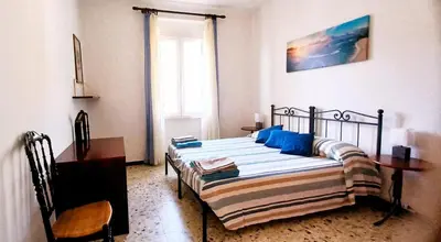 Letto o letti in una camera di CASA PEONIA Lovely Flat