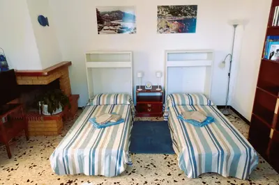 Letto o letti in una camera di CASA PEONIA Lovely Flat