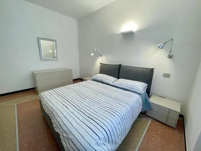 Letto o letti in una camera di Casa Tulipano