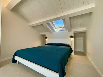 Letto o letti in una camera di Casa Roma
