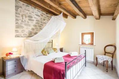 Letto o letti in una camera di Agriturismo di là dall'Acqua