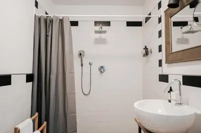 Bagno di Tra le case di Reggio - Passo Buole