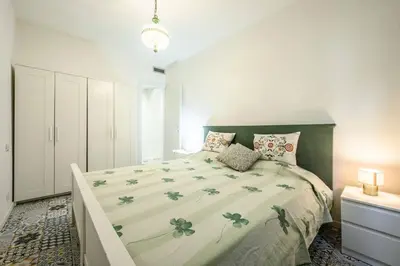 Letto o letti in una camera di Le Finestre sul Borgo 2