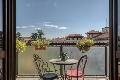 Balcone o terrazza di SUITE ANGOLO ALLA STAZIONE - Appartamento con terrazzo panoramico