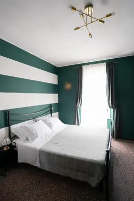 Letto o letti in una camera di D.I DREAM