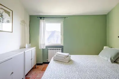 Letto o letti in una camera di Quiet and Cozy home with Wi-Fi CASA PREARINO