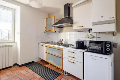 Cucina o angolo cottura di Quiet and Cozy home with Wi-Fi CASA PREARINO