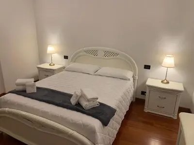 Letto o letti in una camera di Foresteria La Corte