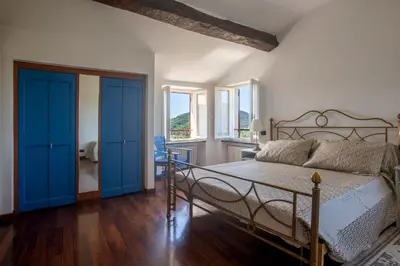Letto o letti in una camera di 164- Villa della Marchesa - Giardino e Piscina a pochi minuti dal centro di Sestri Levante