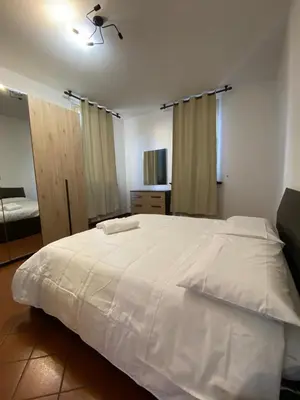Letto o letti in una camera di Host San Pietro
