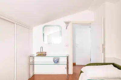 Letto o letti in una camera di Casa Elvira - Centro storico sul mare a Rapallo