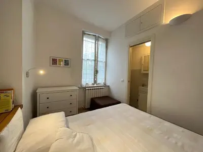 Letto o letti in una camera di Appartamento Stella