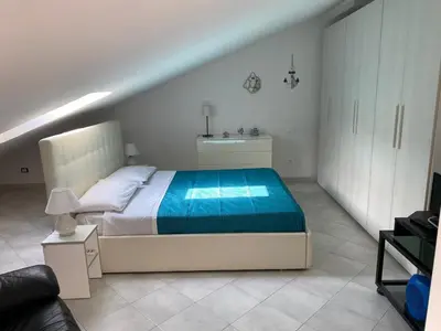 Letto o letti in una camera di AriMAnd House