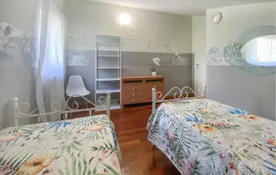 Letto o letti in una camera di Nice Apartment In Magliano With Wifi