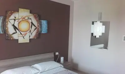 Letto o letti in una camera di affittacamere emilia SELF CHECK IN