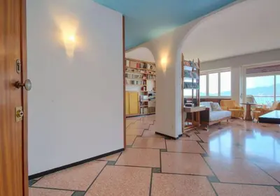 Area soggiorno di Dolce Acqua Flexyrent apartment Terrace & Parking - NO AC