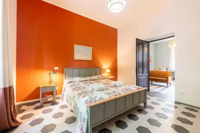 Letto o letti in una camera di GuestHost - Borgo Bliss in Parma's San Giuseppe District