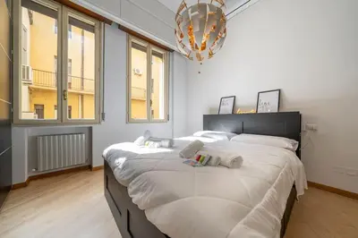 Letto o letti in una camera di [Duomo] Delizioso appartamento nel cuore di Modena