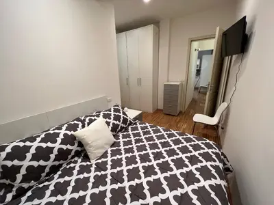 Letto o letti in una camera di Rose & Stelle - Favoloso appartamento in centro
