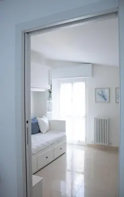 Letto o letti in una camera di Sestri Chic - A Due Passi dal Mare