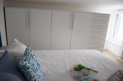 Letto o letti in una camera di Sestri Chic - A Due Passi dal Mare