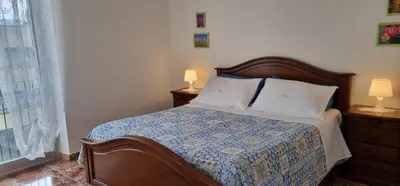 Letto o letti in una camera di La vie en rose flat