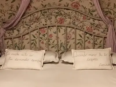 Letto o letti in una camera di Aria di Campagna