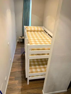 Letto o letti in una camera di San Benedetto Rooms