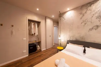 Letto o letti in una camera di San Benedetto Rooms