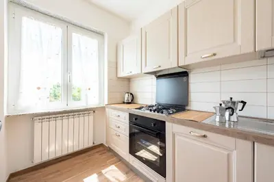 Cucina o angolo cottura di JOIVY Villa Guanna - Charming Flat with Garden