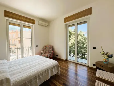 Letto o letti in una camera di Appartamento Mediterraneo