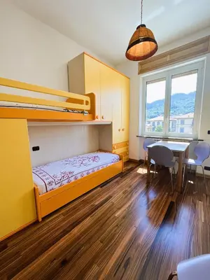 Letto o letti in una camera di Appartamento Mediterraneo