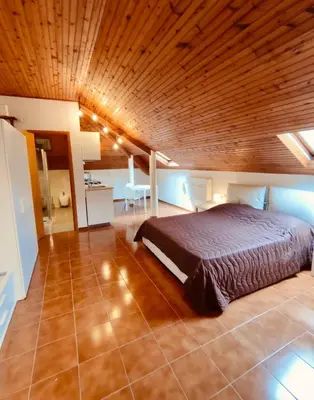 Letto o letti in una camera di CASTAGNETO 8