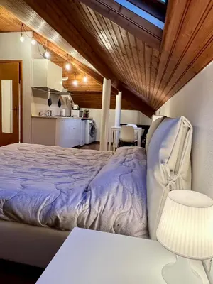 Letto o letti in una camera di CASTAGNETO 8