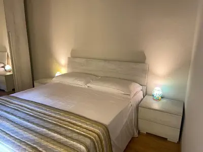 Letto o letti in una camera di Maison Vert appartamento in centro storico a Modena