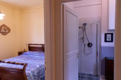Letto o letti in una camera di Casa nella campagna Parmigiana.