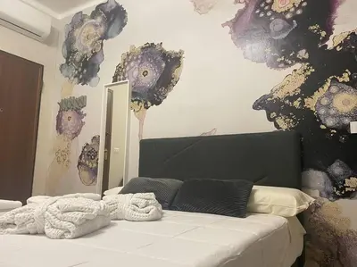 Letto o letti in una camera di Cucchiari Suite 7A