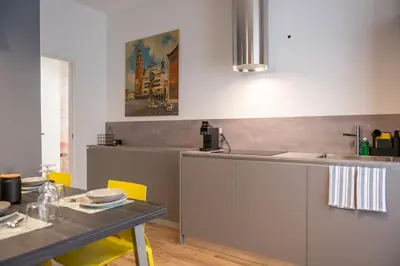 Cucina o angolo cottura di Fortitudo Appartamento Duomo Cremona Self Check-in Centro Storico