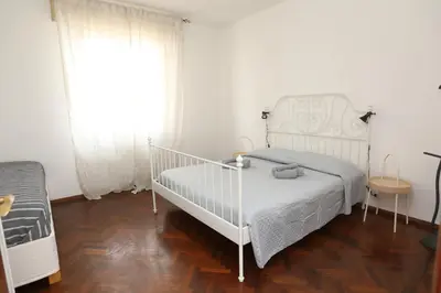 Letto o letti in una camera di Dalla Nonna Casa Vacanze
