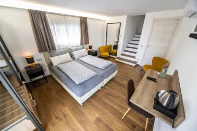 Letto o letti in una camera di Vinomare Guesthouse