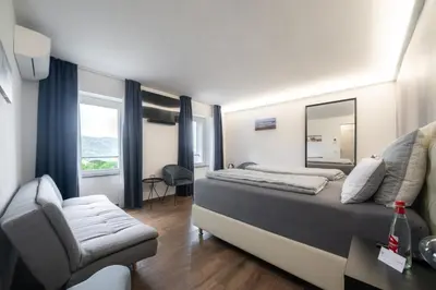 Letto o letti in una camera di Vinomare Guesthouse