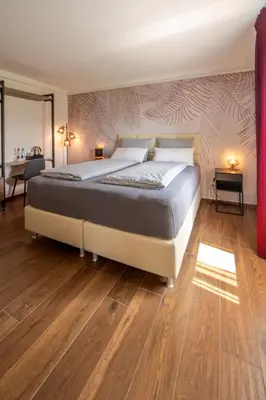 Letto o letti in una camera di Vinomare Guesthouse