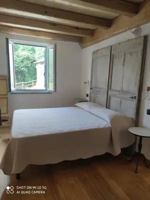Letto o letti in una camera di La Pezzuola 53