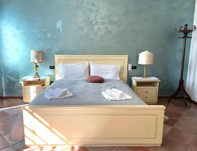 Letto o letti in una camera di Villa Rita - Rooms&Art
