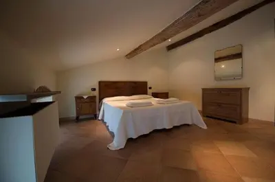 Letto o letti in una camera di Agriturismo Arte Contadina