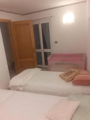 Letto o letti in una camera di Appartamento Vacanze Malù